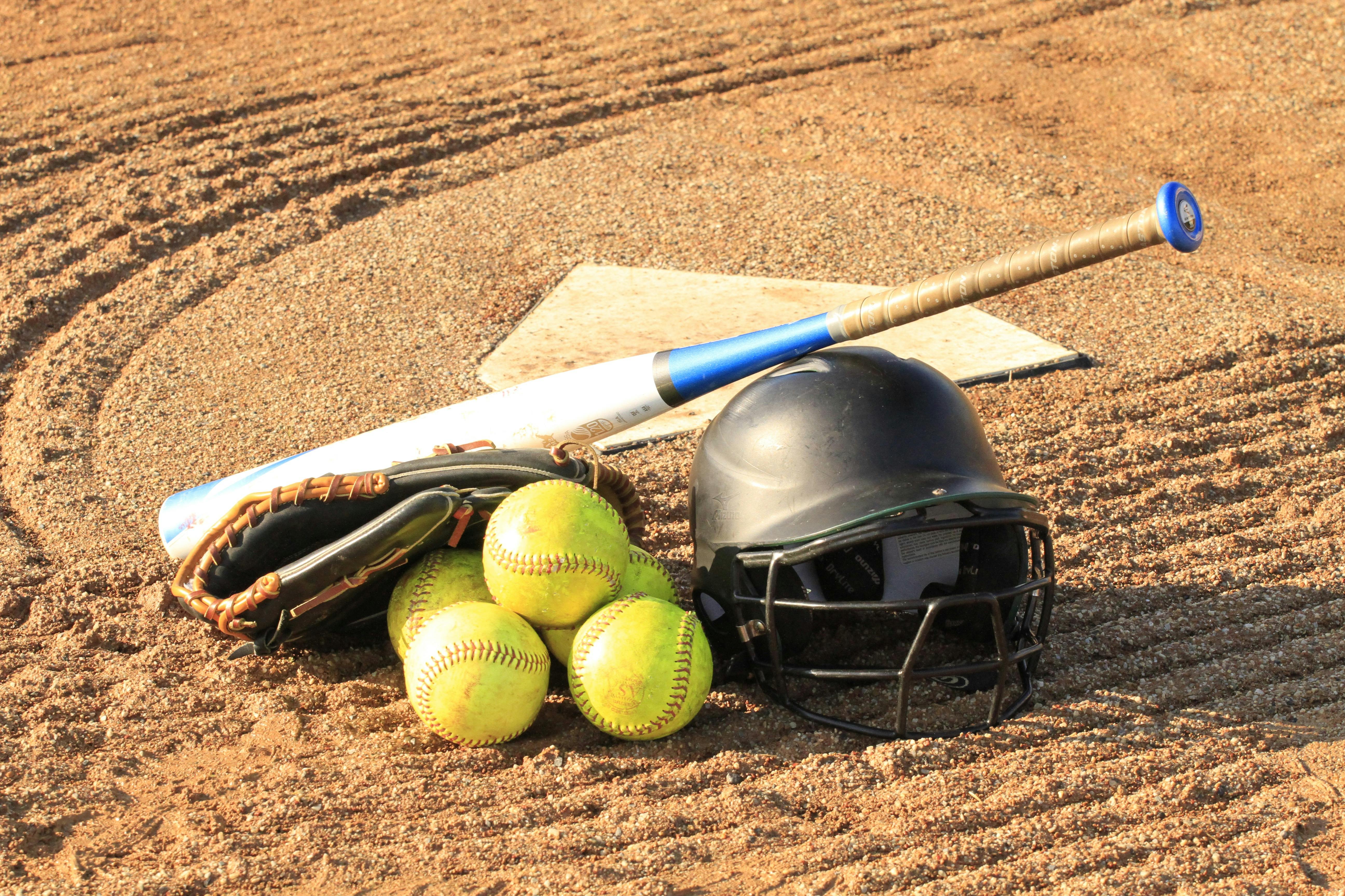 An image of a listed item. A baseball bat on a field.
